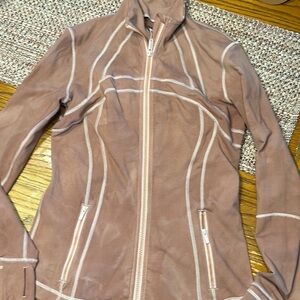 Women’s size 4 Lululemon jacket. Pinkish color.
